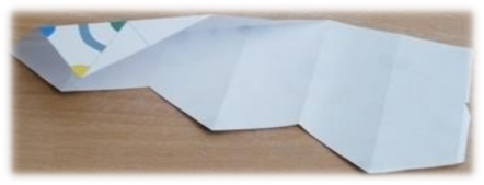 Fold the diagonal lines backwards (mountain folding)